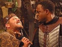 Trelak, First prime of Ares, threatens King Arkhan the First, aka Maybourne